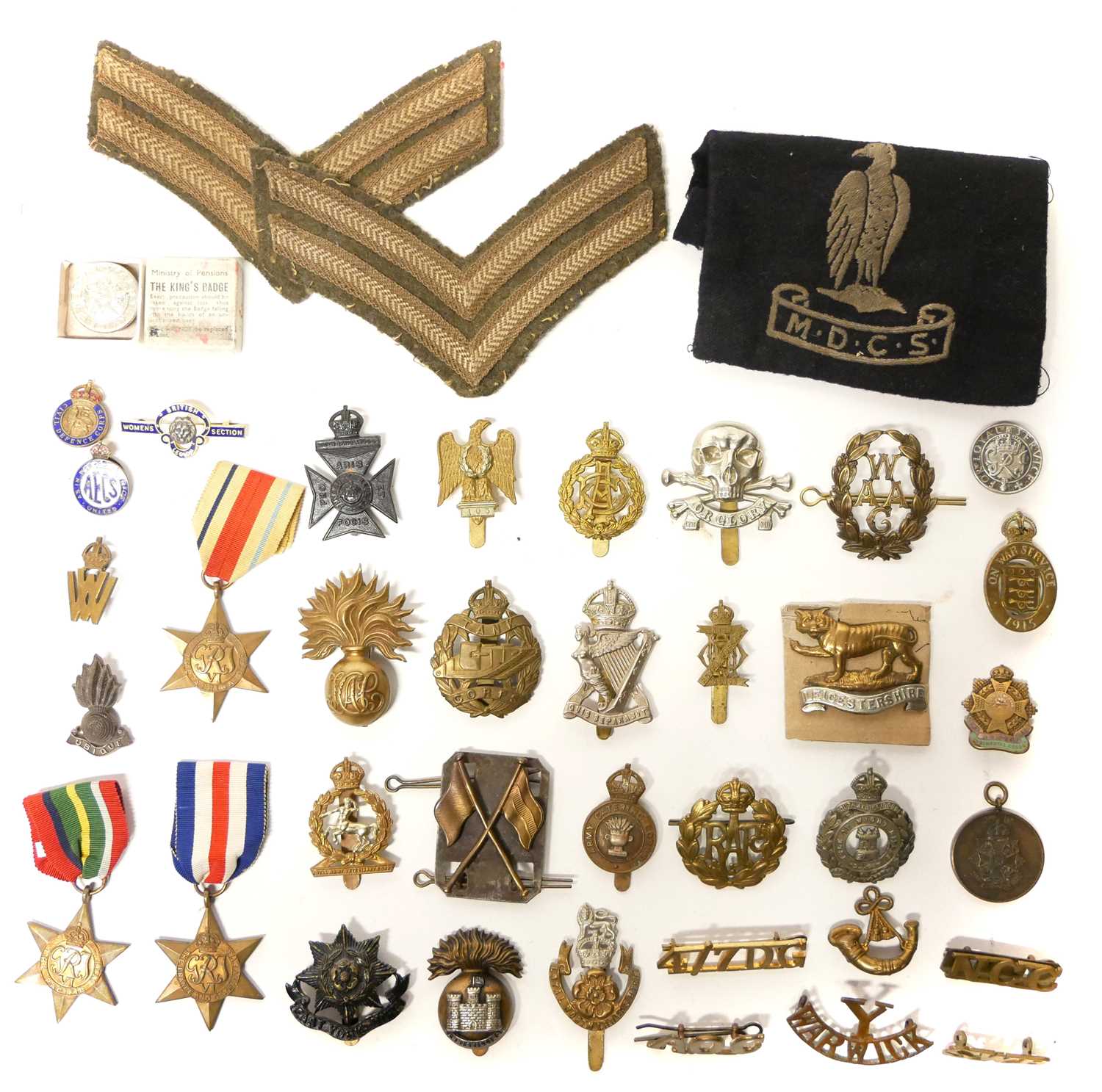 Lot 488 - Collection of cap badges, WWII medals and