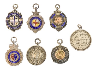 Lot 131 - A selection of silver fobs