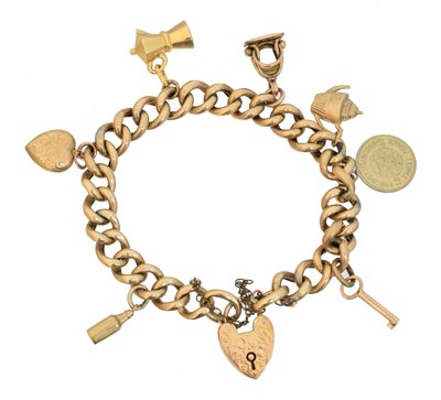 Lot 47 - A 9ct gold charm bracelet