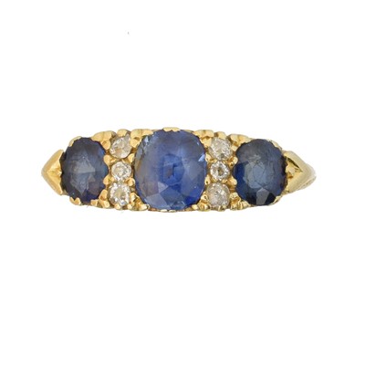 Lot 159 - An 18ct gold sapphire and diamond dress ring