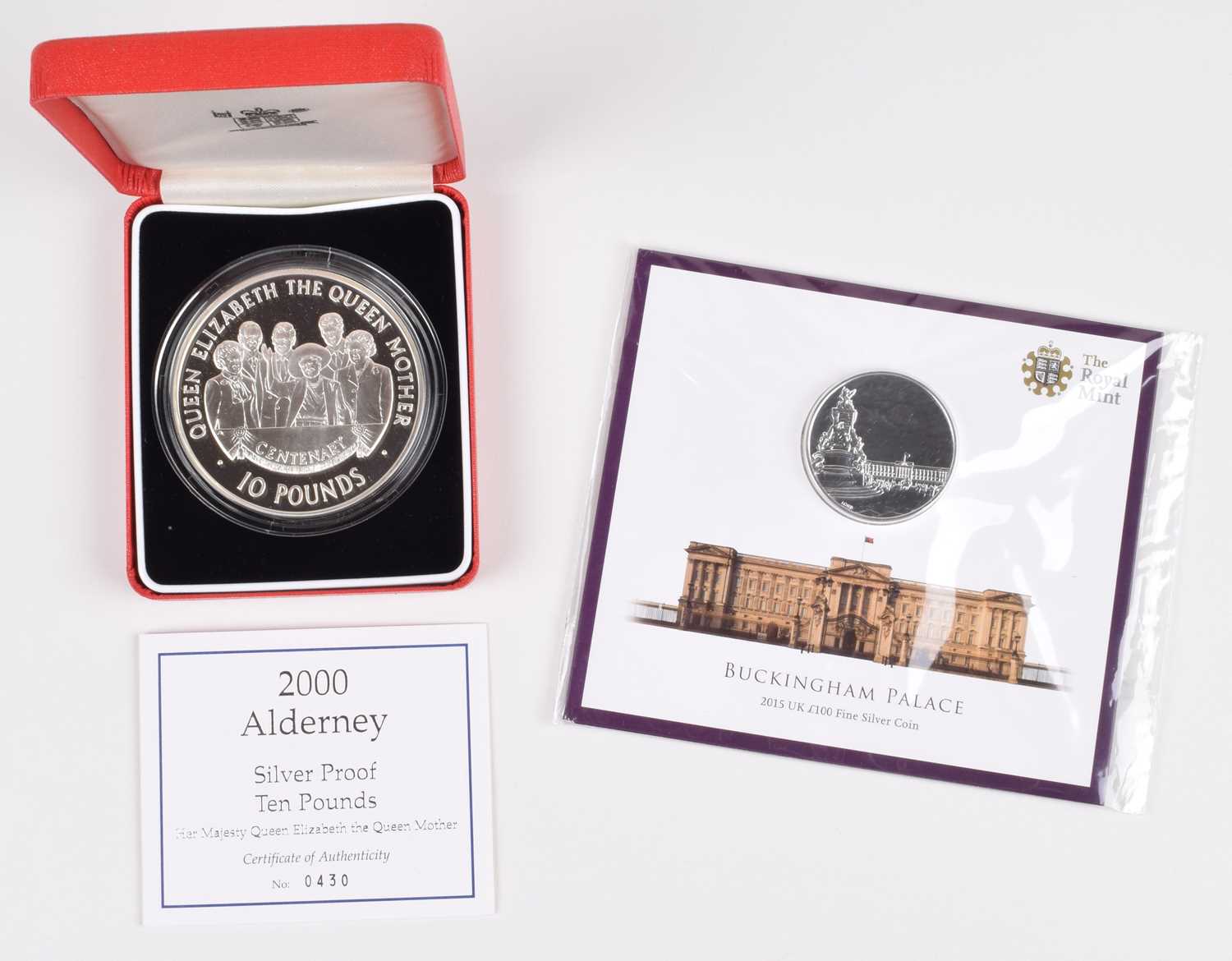 Lot 75 - 2000 Alderney Silver Proof Ten Pounds and Buckingham Palace £100 Silver Coin (2).