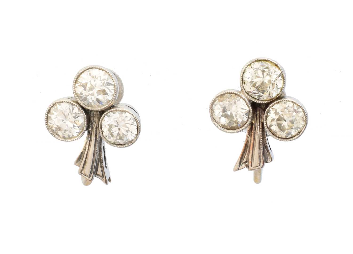 Lot 61 - A pair of early 20th century diamond earrings