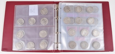 Lot 2 - Four albums of historic and later silver and other coinage.