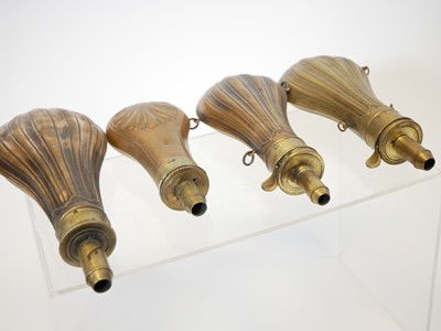 Lot 285 - Four powder flasks