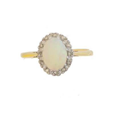 Lot 60 - An opal and diamond cluster ring