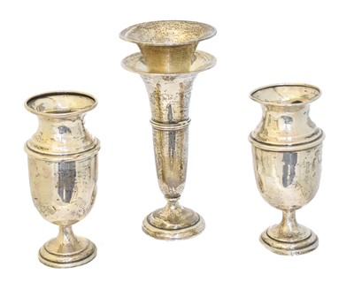 Lot 157 - Four George V silver vases