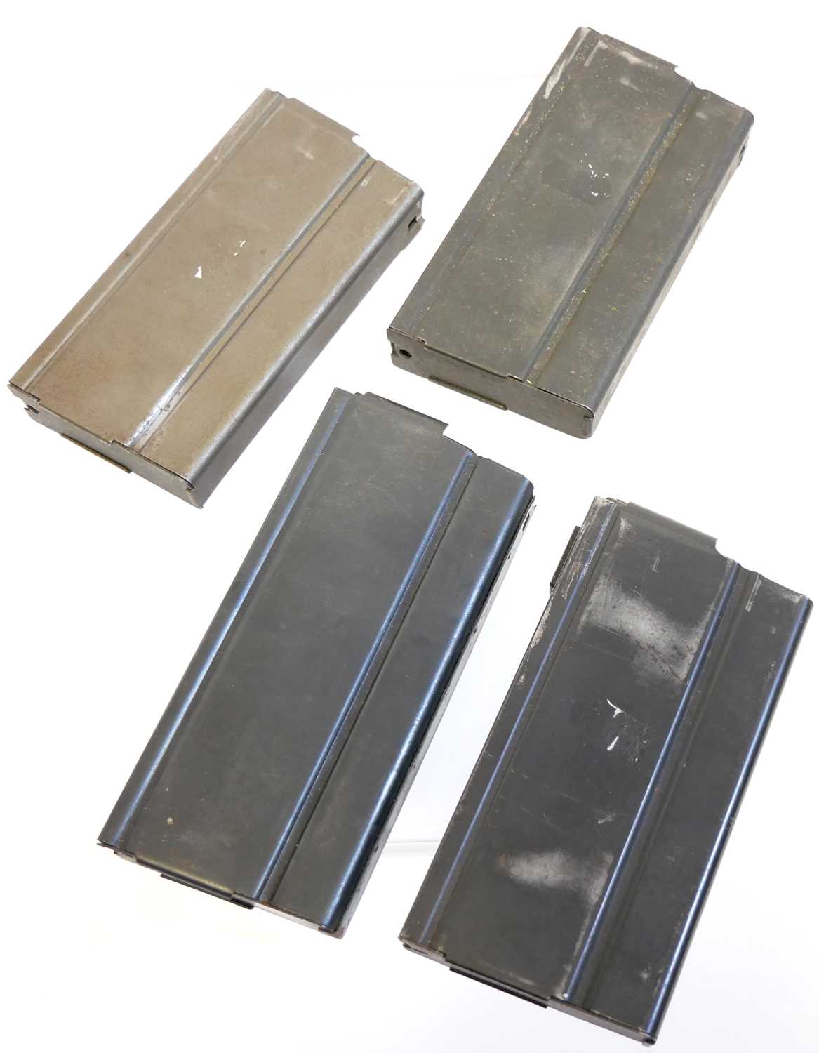 Lot 310 - Four M14 rifle magazines, three original and one aftermarket