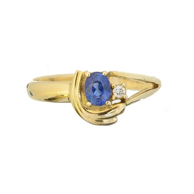 Lot 163 - A sapphire and diamond dress ring