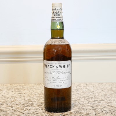 Lot 73 - 1 bottle in extremely good condition from 1949, “Black & White” ‘Choice Old Scotch Whisky’