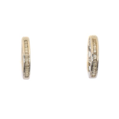Lot 19 - A pair of 9ct gold diamond hoop earrings