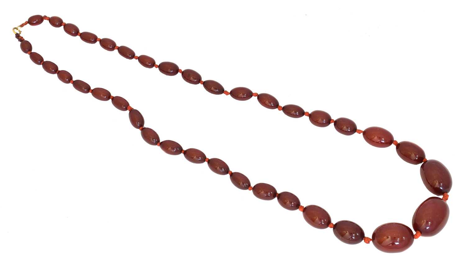 Lot 84 - A cherry bakelite necklace