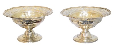 Lot A pair of Victorian cased silver pedestal bowls