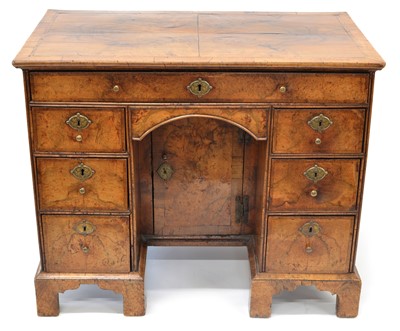 Lot 314 - George II Walnut and Feather-Banded Kneehole Desk