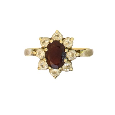 Lot 59 - A 9ct gold garnet and paste cluster ring