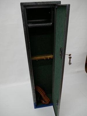 Lot 288 - Steel gun cabinet with two sets of keys.
