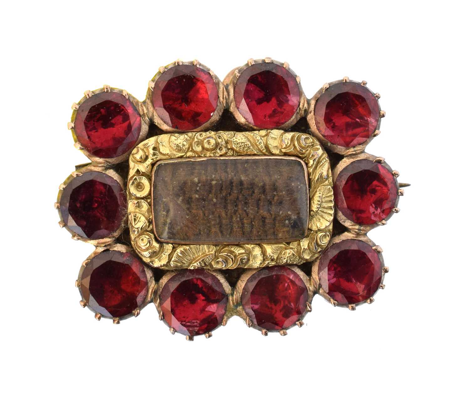 Lot 9 - An early 19th century garnet mourning brooch