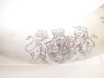 Lot 273 - 21st century Scrimshaw horn with display stand