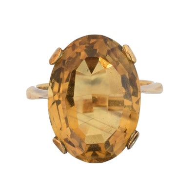 Lot 128 - A 9ct gold citrine dress ring