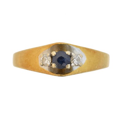 Lot 131 - An 18ct gold sapphire and diamond three stone ring