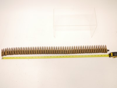 Lot 317 - Machine gun belt of 59 7.62 inert rounds
