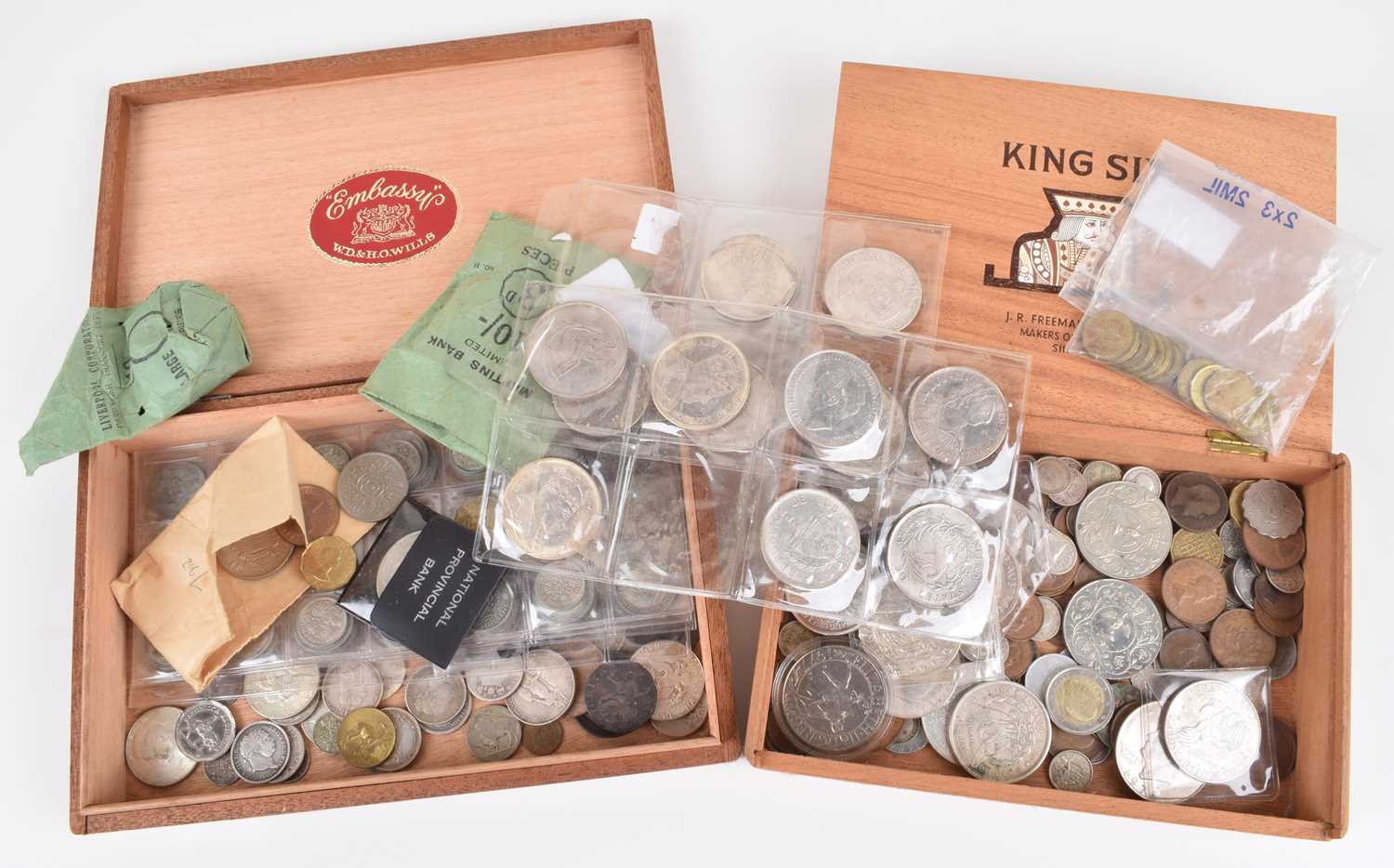 Lot 16 - Two boxes of assorted British and foreign coinage to include some silver and copper coinage.