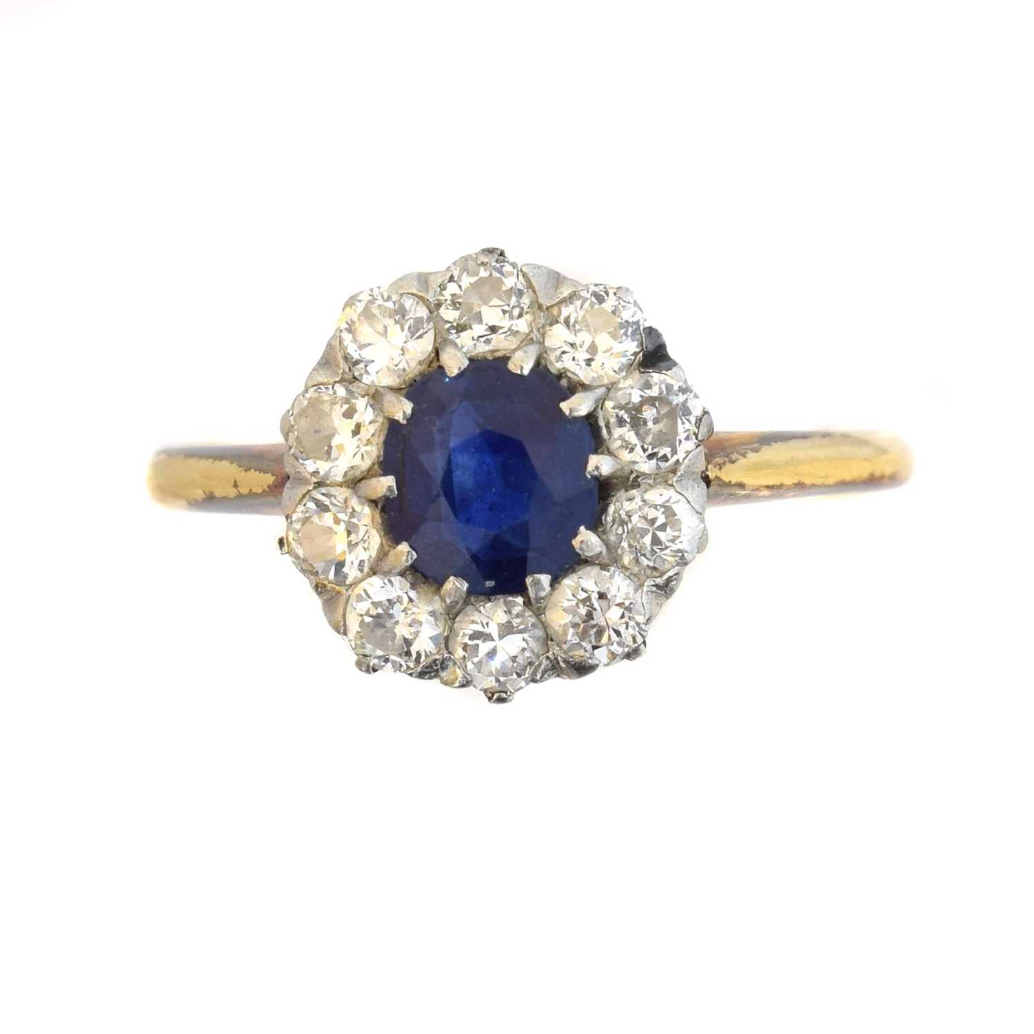 Lot 153 - An 18ct gold sapphire and diamond cluster ring