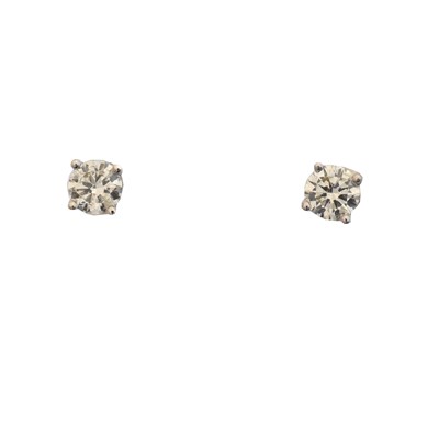 Lot 57 - A pair of diamond stud earrings