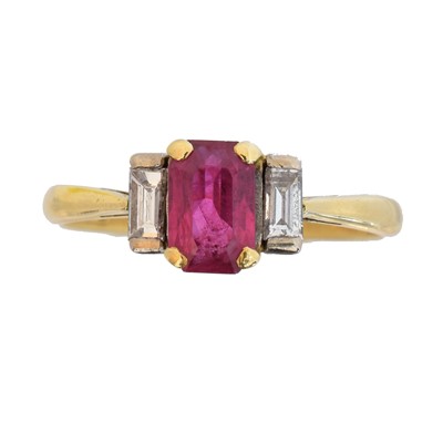 Lot 112 - An 18ct gold ruby and diamond three stone ring