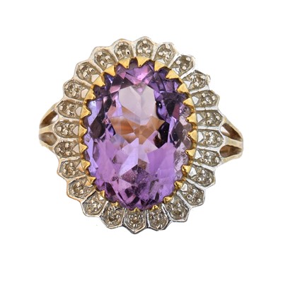 Lot 66 - A 9ct gold amethyst and diamond cluster ring