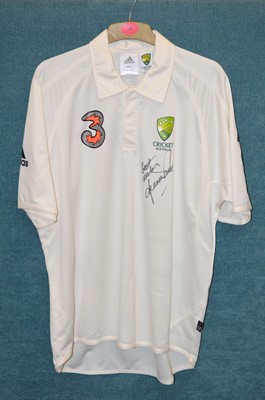 Lot 72 - Shane Warne autographed Australia shirt and miniature cricket bat signed by Freddie Flintoff