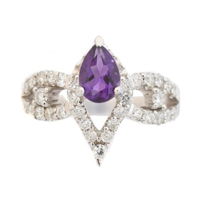 Lot 165 - An amethyst and diamond dress ring