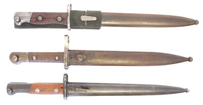Lot 264 - Three Mauser rifle bayonets and scabbards