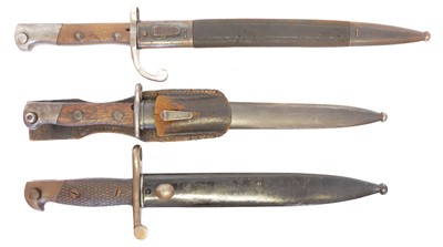 Lot 266 - Three Mauser rifle bayonets and scabbards