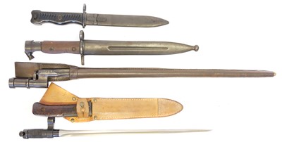 Lot 275 - Four bayonets and scabbards and one spike bayonet