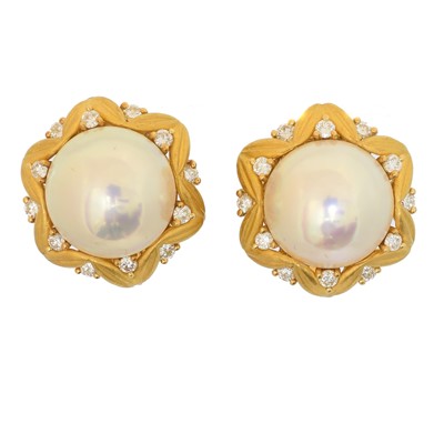 Lot 63 - A pair of mabe pearl and diamond earrings