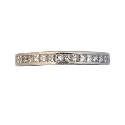 Lot 144 - A platinum diamond band ring