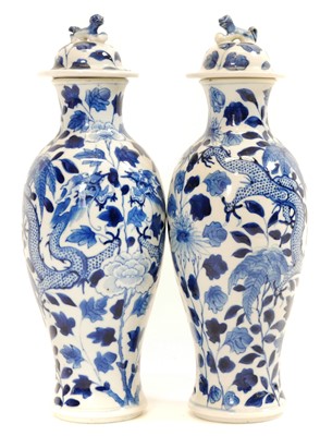 Lot 186 - Pair of Chinese blue and white lidded vases