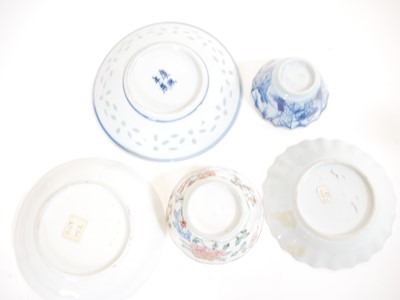 Lot 187 - Two Chinese teabowls and saucers and one other saucer