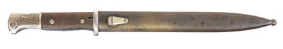 Lot 250 - German Third Reich bayonet and scabbard with post WWII added etching.