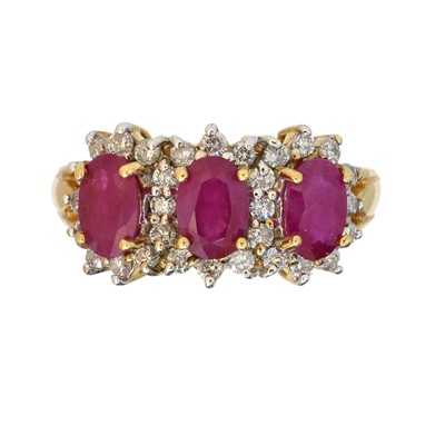 Lot 169 - An 18ct gold ruby and diamond cluster ring