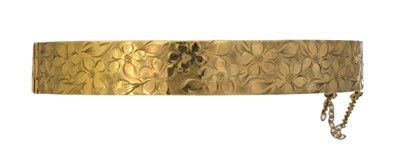 Lot 67 - A 9ct gold hinged bangle