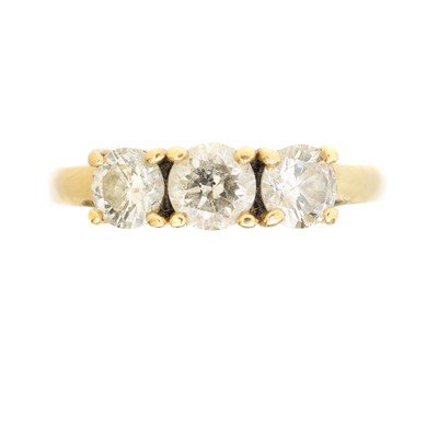Lot 215 - An 18ct gold diamond three stone ring
