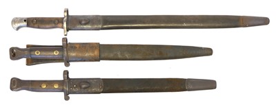 Lot 236 - Three British Lee Enfield rifle bayonets and scabbards