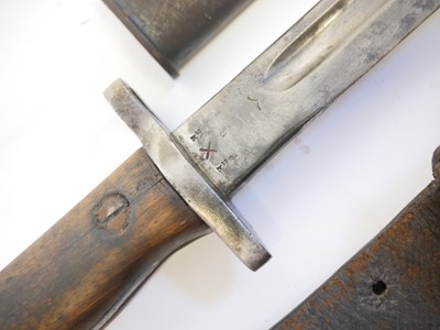 Lot 236 - Three British Lee Enfield rifle bayonets and scabbards