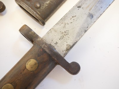 Lot 236 - Three British Lee Enfield rifle bayonets and scabbards