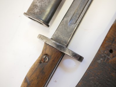 Lot 236 - Three British Lee Enfield rifle bayonets and scabbards