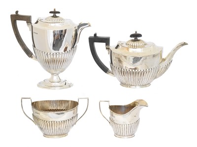 Lot 133 - A George V silver four piece tea set