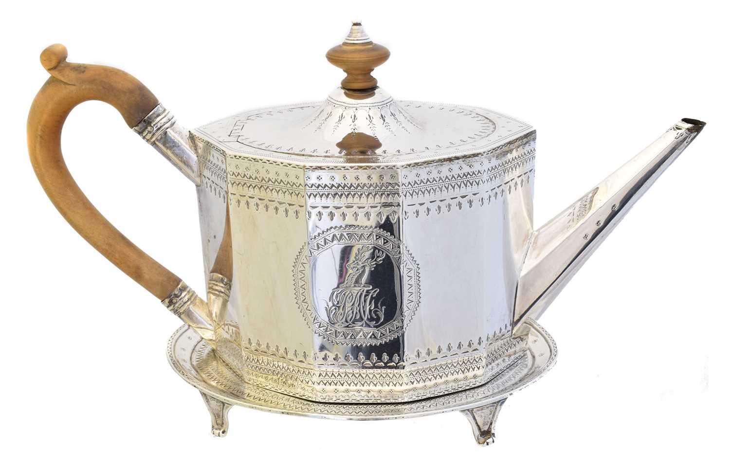 Lot 19 - A George III silver teapot on stand