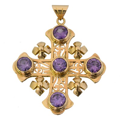 Lot 100 - A synthetic colour change sapphire cross pendant