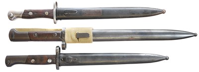 Lot 217 - Three Mauser rifle bayonets and scabbards